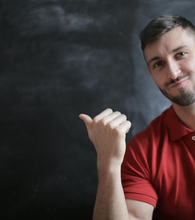 Portrait of a friendly and confident male instructor.